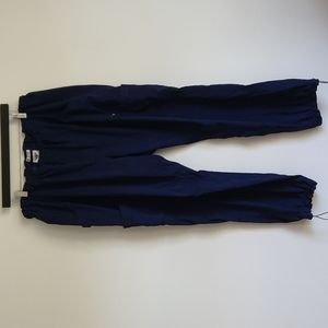 Koi Tech navy elastic waist pants front back and side pockets draw string…